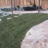 Backyard lawn path border with concrete and garden edging in Chula Vista.