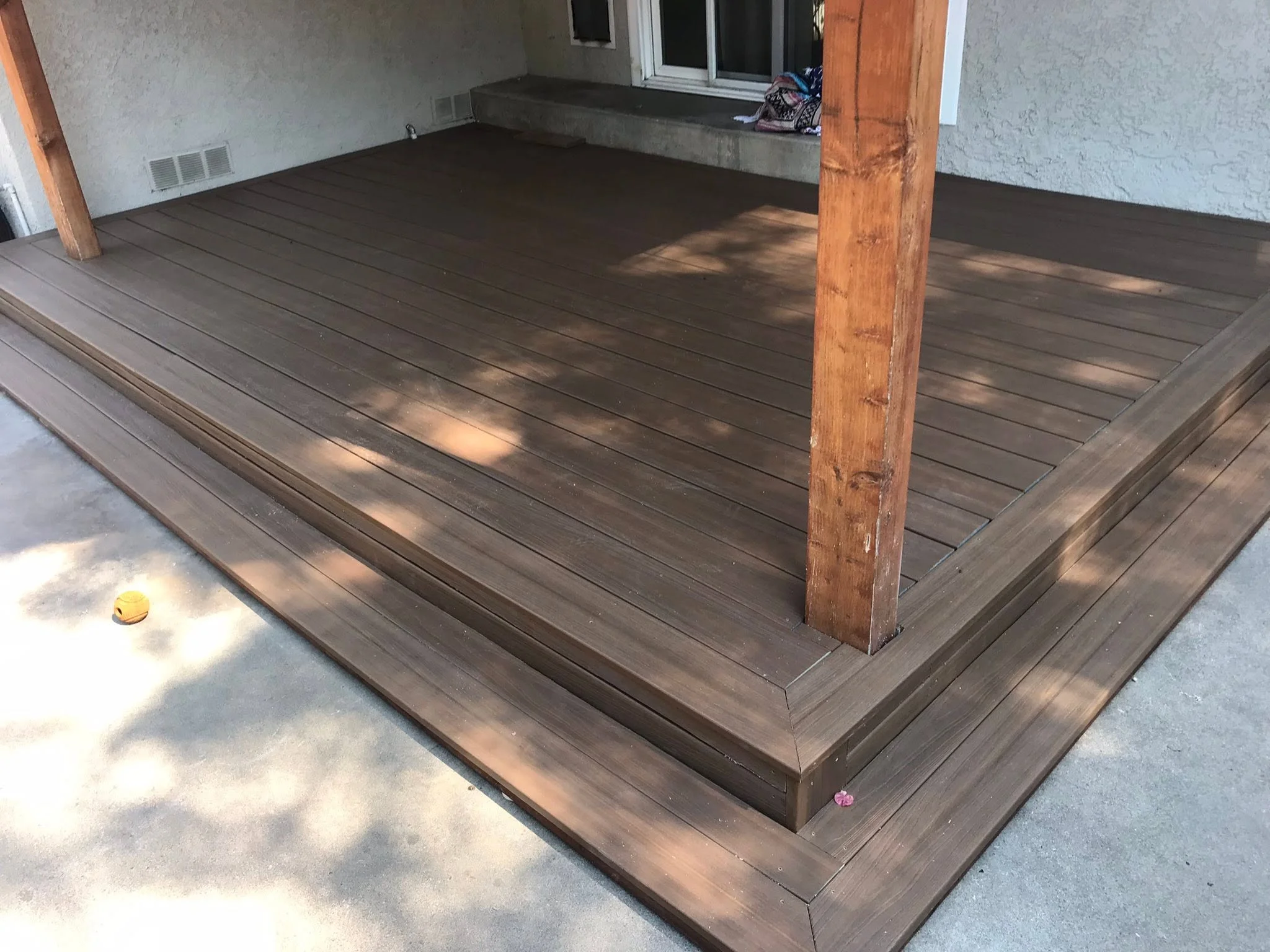 Composite deck patio surface completed for residential landscaping services in Chula Vista.